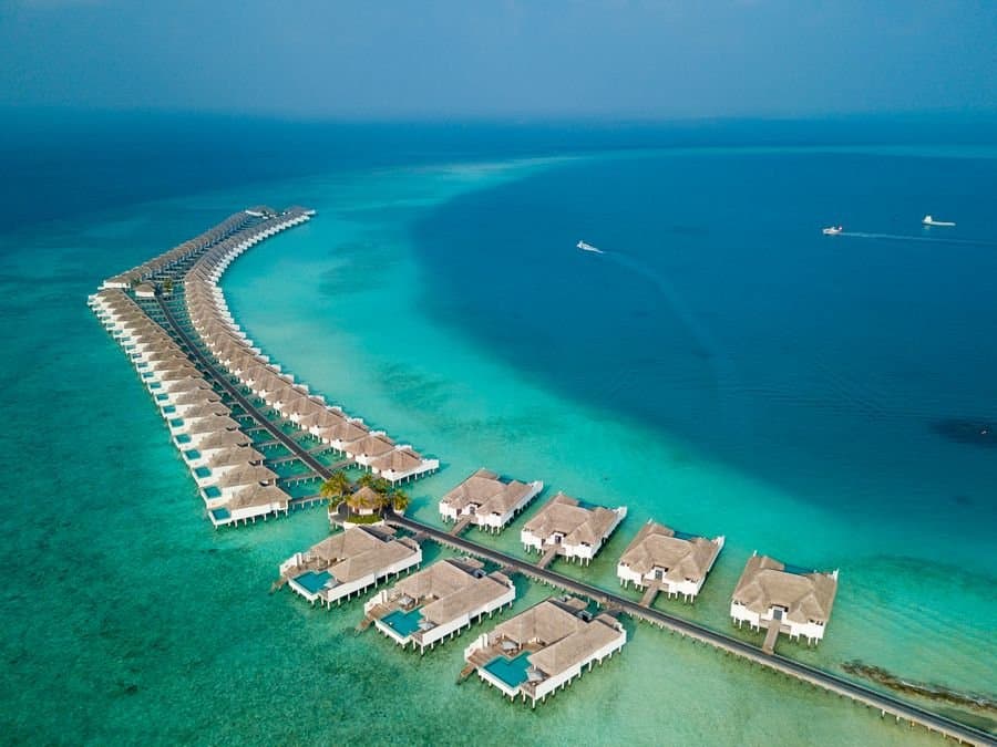 Overwater villas on a turquoise lagoon, Maldives