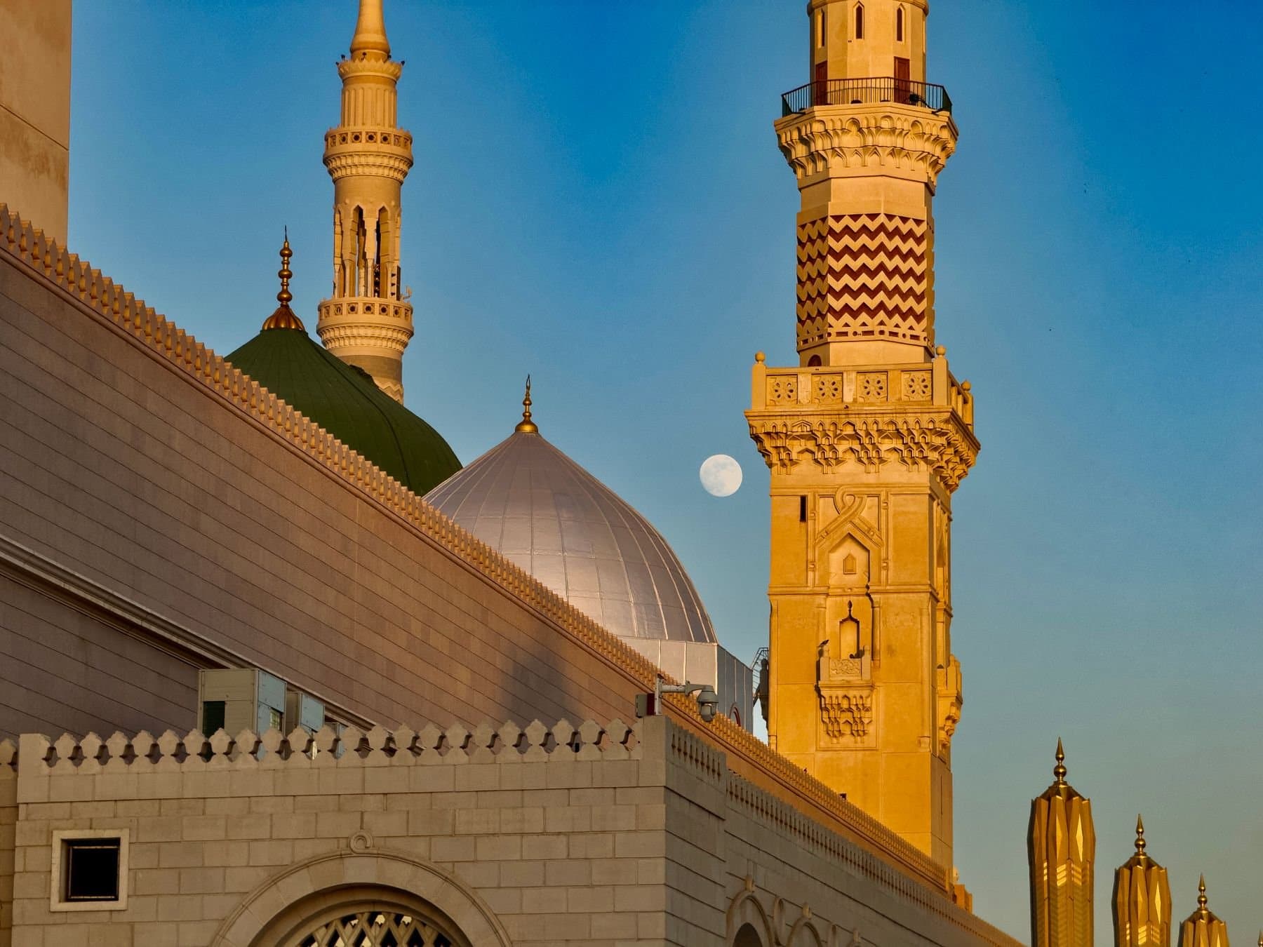 Minarets of the Prophet's Mosque in Madinah at dusk